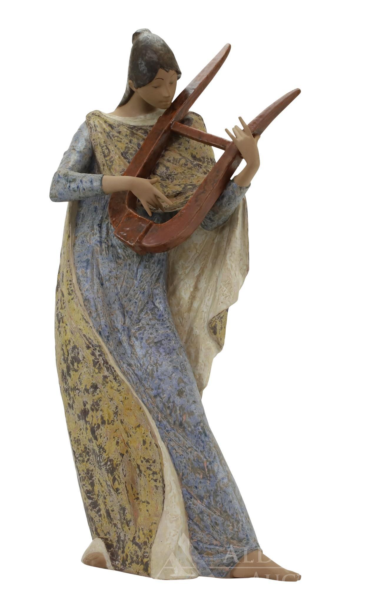 Lladro Porcelain Figure: "Musa Lirica" signed and numbered Antonio Ruiz, standing woman with harp, measuring 35"h x 19"w x 10"d.