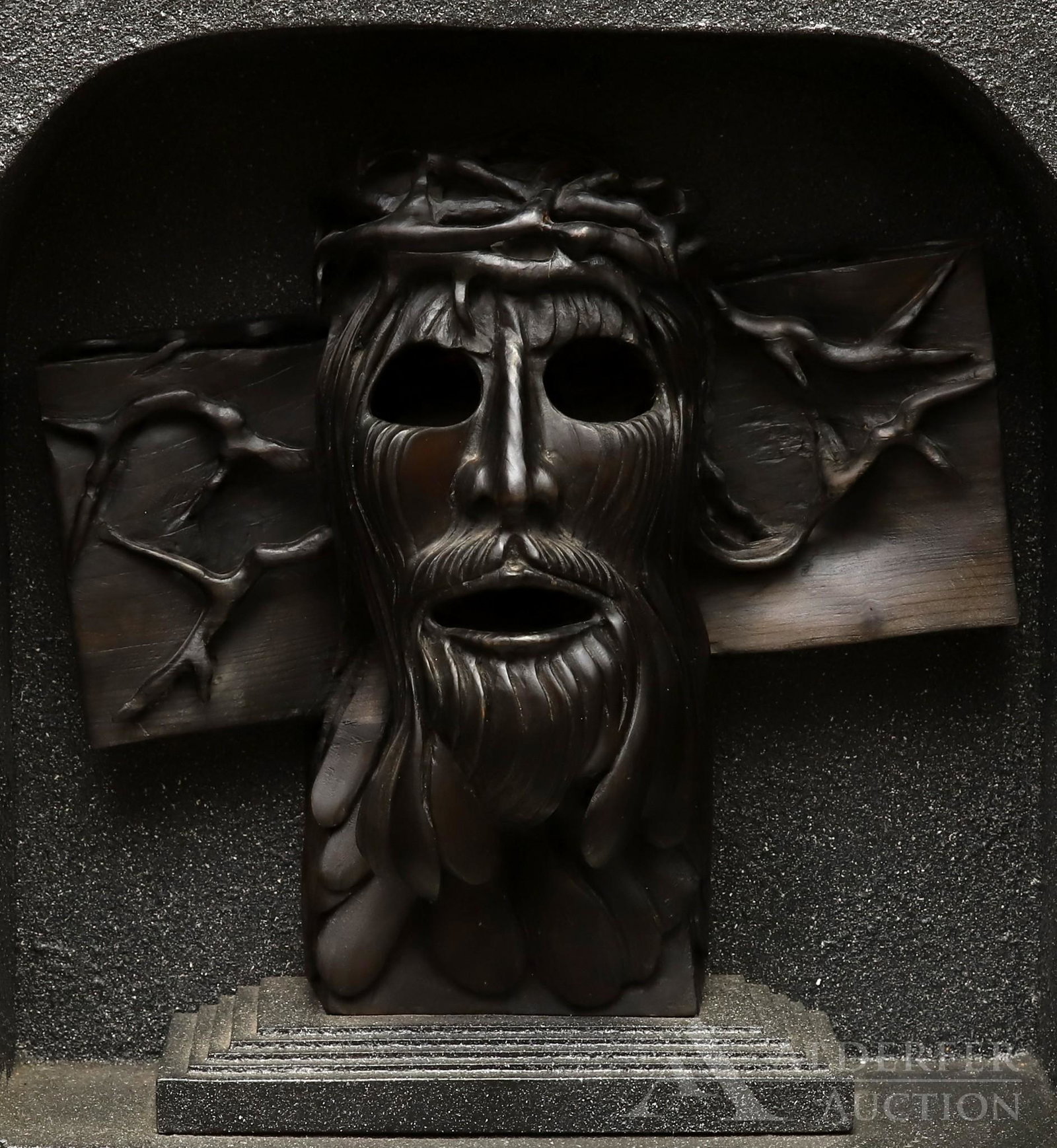 Wayne Forbes (1945-2013): Composite and wood sculpture, unsigned. Rounded corner "headstone" with hinged doors, opens to reveal carved Jesus head with crown of thorns and vacant eyes. 20"h x 20"w x 8"d