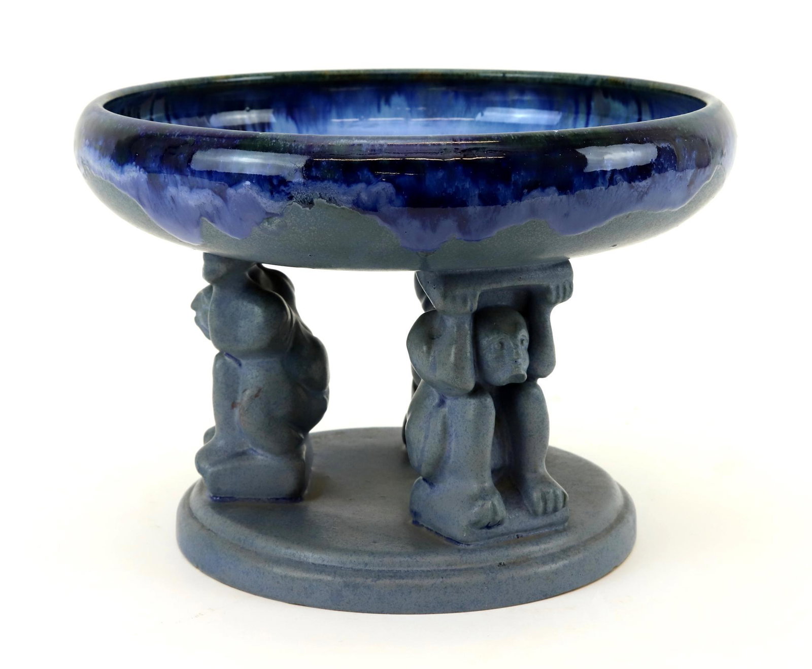 Fulper Pottery Compote: Blue "Aztec" compote with glazed bowl raised upon three effigy style figures. 7.5"h x 10.75"round