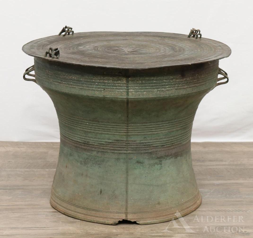Southeast Asian Rain Drum: Bronze temple drum end table. 18.25"h and 23.5"round