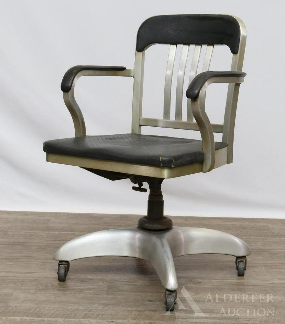 Goodform Desk Chair: Chrome and faux leather rolling desk chair. Label on back. 33.5"h x 21.5"w x 17/5"d