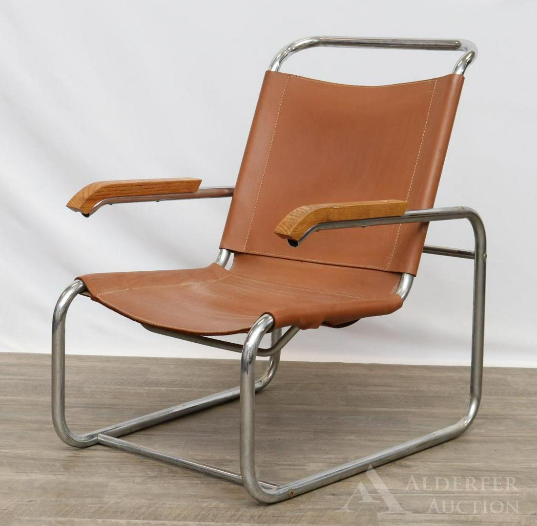 Marcel Breuer for Thonet Lounge Chair: Chrome plated tubular steel chair with leather stitched seat and wood armrests. 33"h x 22"w x 30.5"d