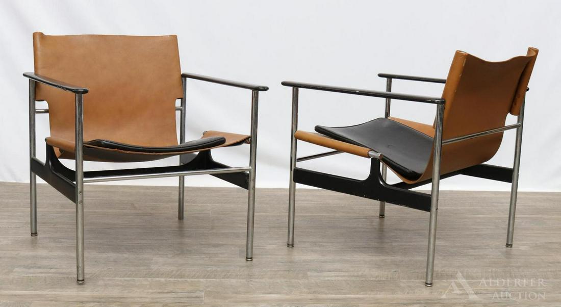 Pair of Charles Pollock for Knoll Sling Chairs: Leather sling chairs (2) with chromed steel frame and black enameled armrest. 27.5"h x 25"w x 22"d