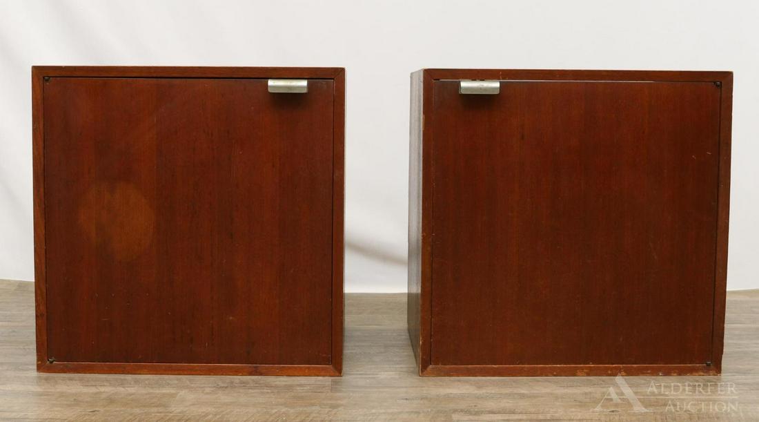 Pair of George Nelson for Herman Miller Cabinets: Walnut side cabinets with adjustable interior shelf. Back panel is missing on one cabinet. 24.25”h x 24”w x 18.5”d