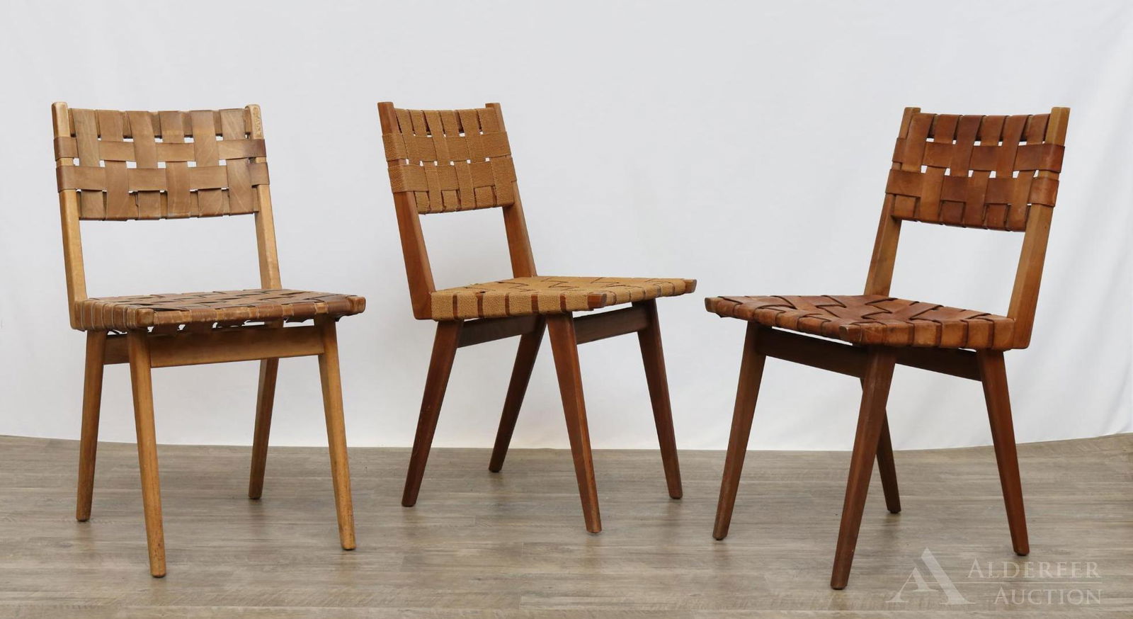 Jens Risom for Knoll Webbed Side Chairs: Set of (3) birch and walnut chairs with leather and canvas webbed backs and seats. 31.5"h x 16.25"w x 15"d