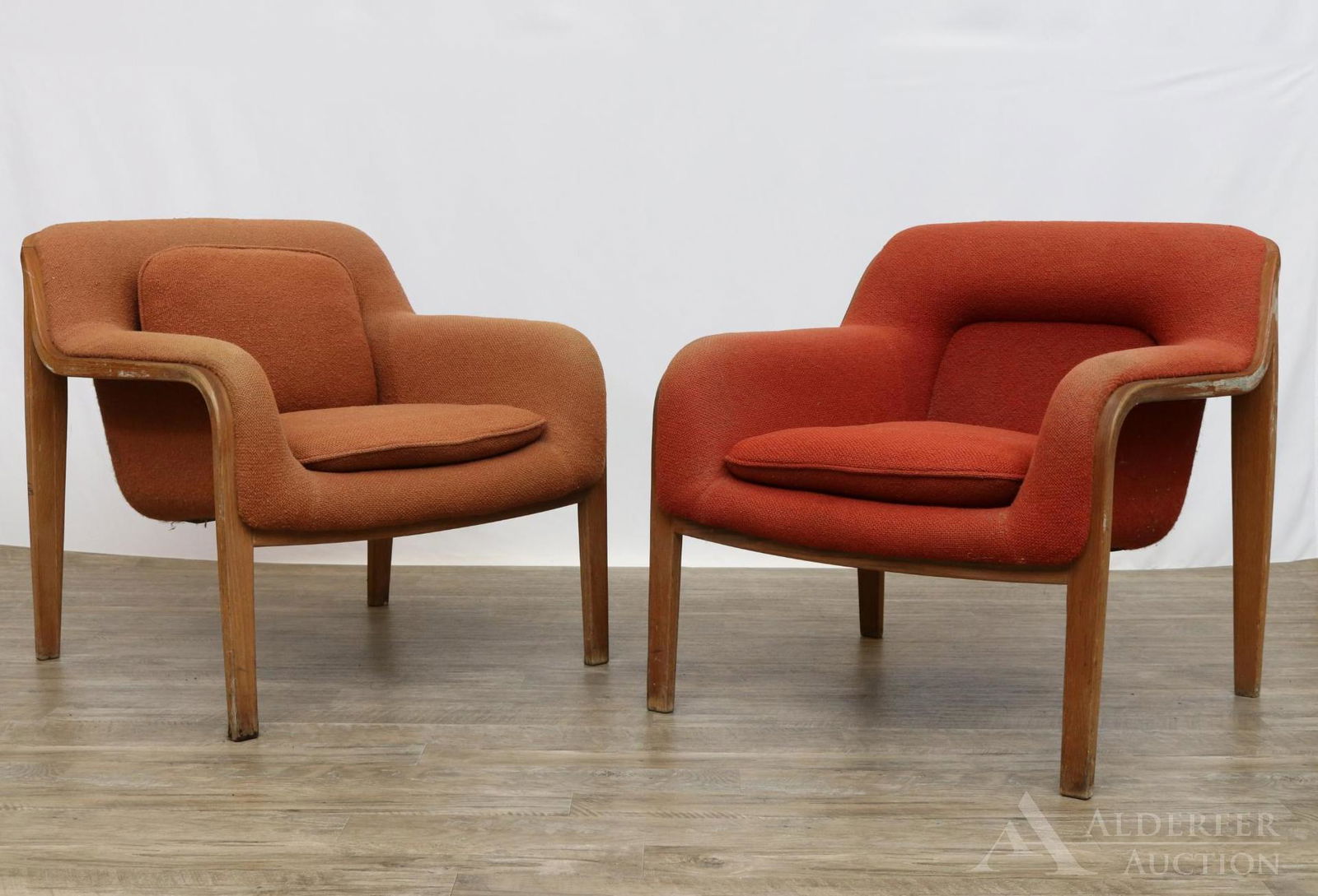 Pair of Bill Stephens for Knoll Lounge Chairs: Birch bentwood conforming frame with rust upholstery. Label on underside. 29"h x 29"w x 26.5"d