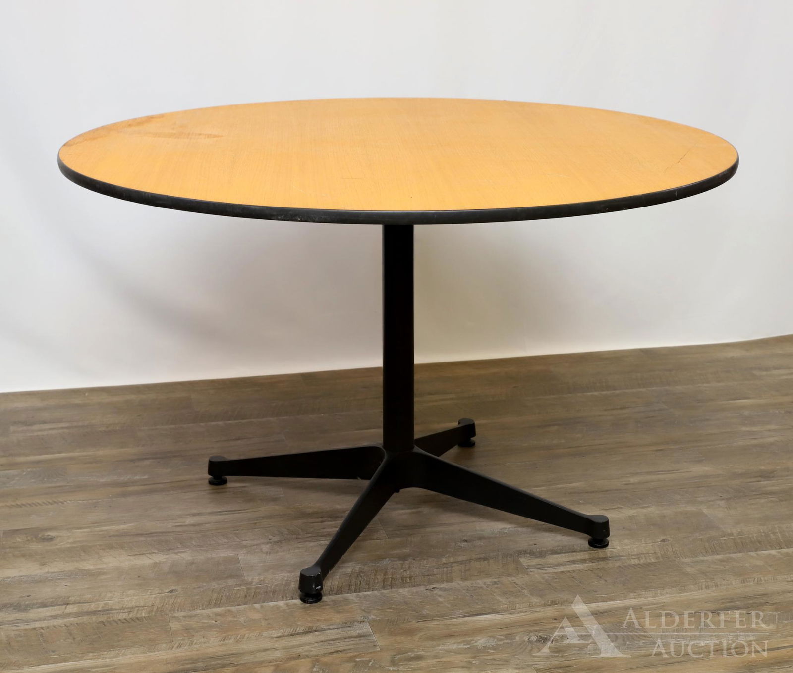 Charles Eames Herman Miller Dining Table: Teakwood veneered top resting on cast enameled aluminum frame. Top is loose from frame and does not come with fastening hardware. 29"h x 48" round