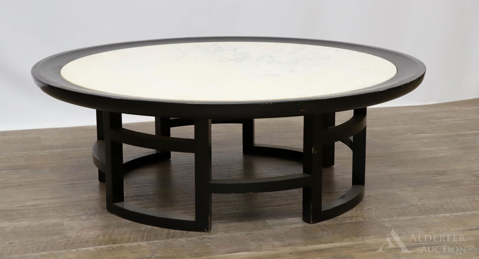 Muller and Barriger for Kittinger Coffee Table: Theodore Muller and Isabel Barriger for Kittinger coffee table, 1950s. Geometric black painted base with inset marble top. 14"h x 42" round