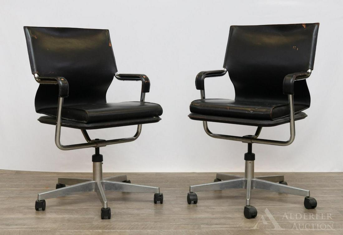 Marcatre Black Leather Desk Chairs: Italian tubular steel frames on rollers. Leather loss on both chairs. Marked underside. 36"h x 22.5"w x 29"d