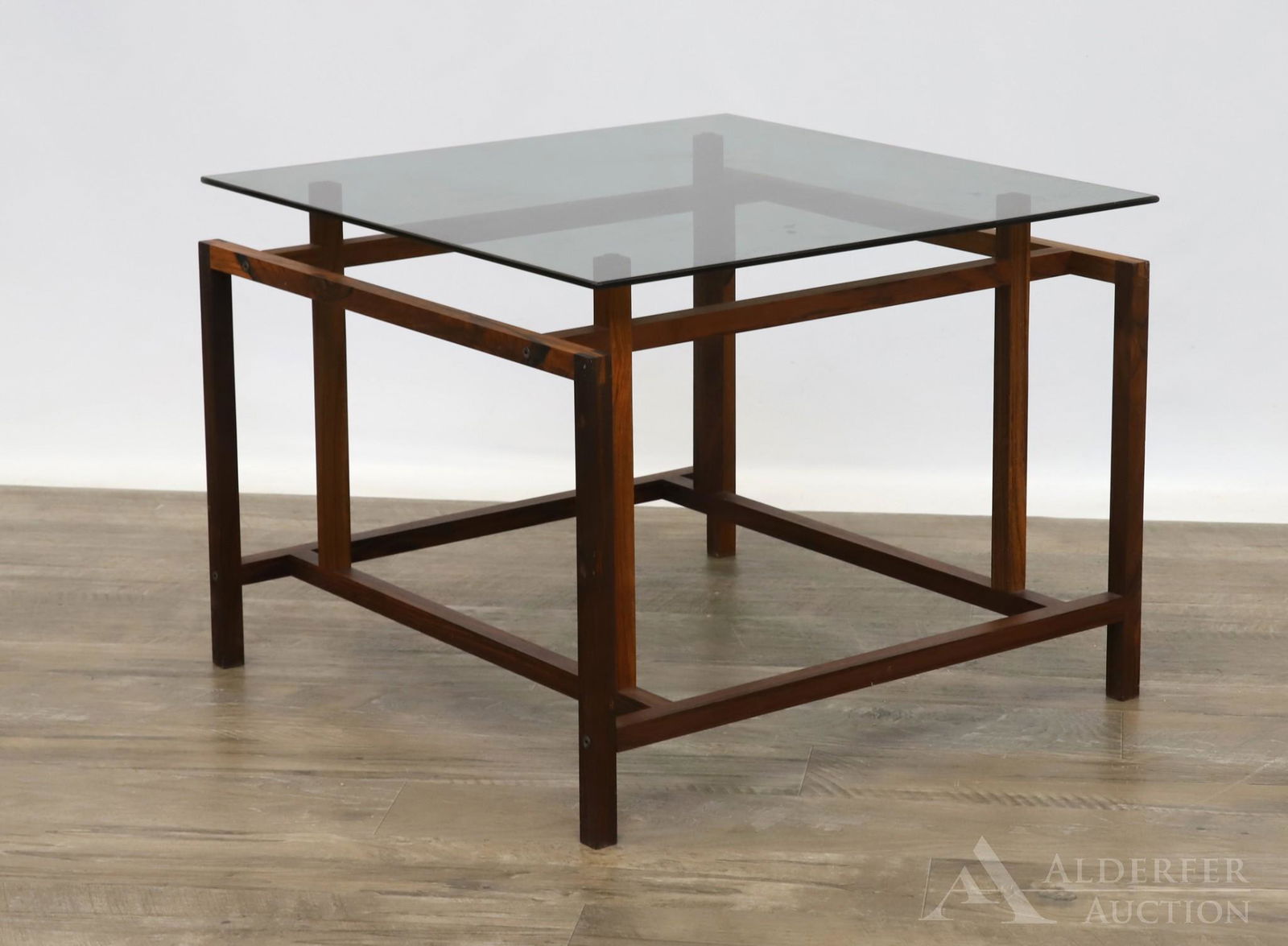 Henning Norgaard for Komfort Mobler Table: Rosewood square frame with a smoked glass top. Label on side. 20"h x 20"square