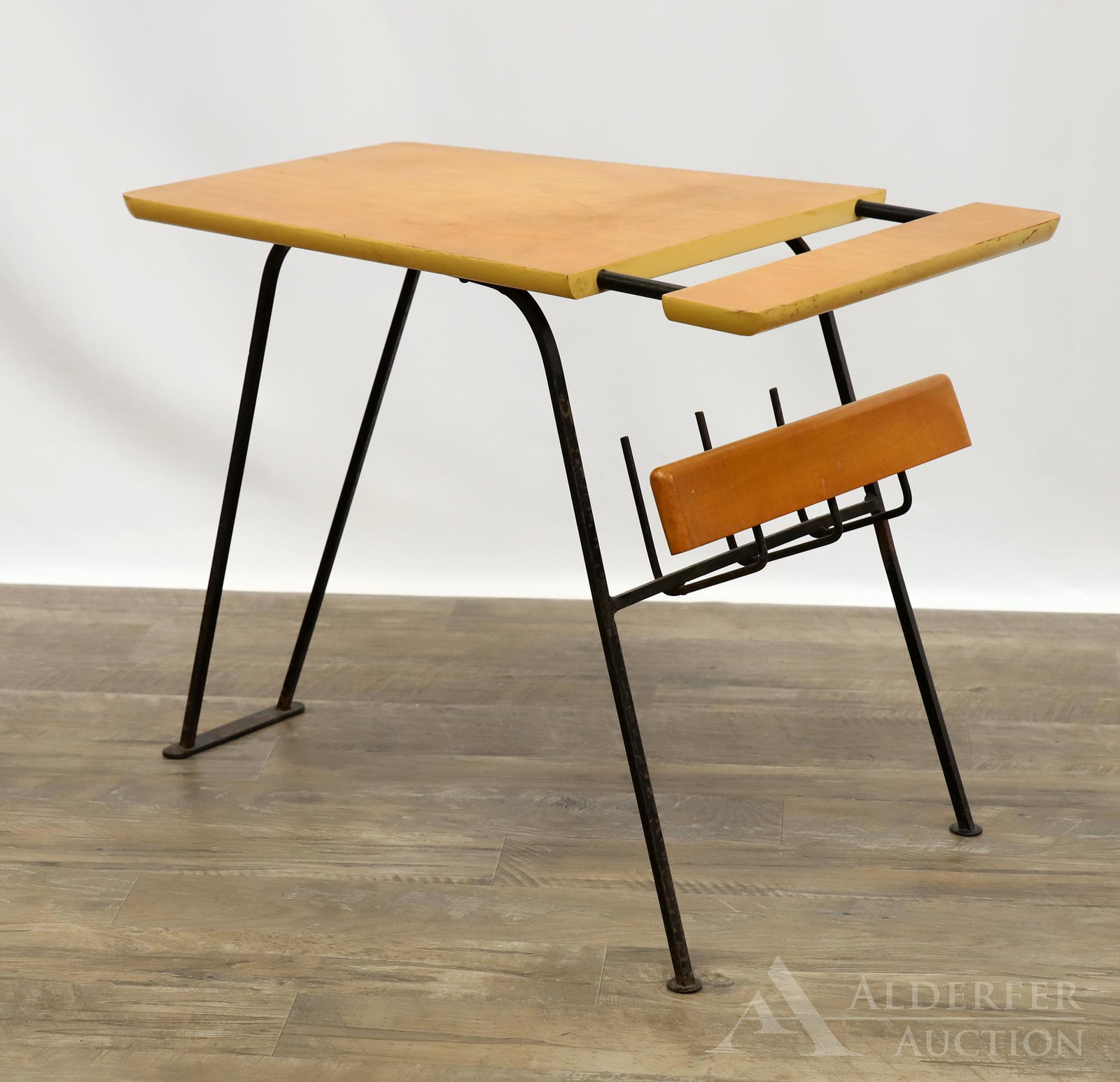 Arthur Umanoff Magazine Table: Wrought iron and wood table. 20"h x 24.5"w x 16"d