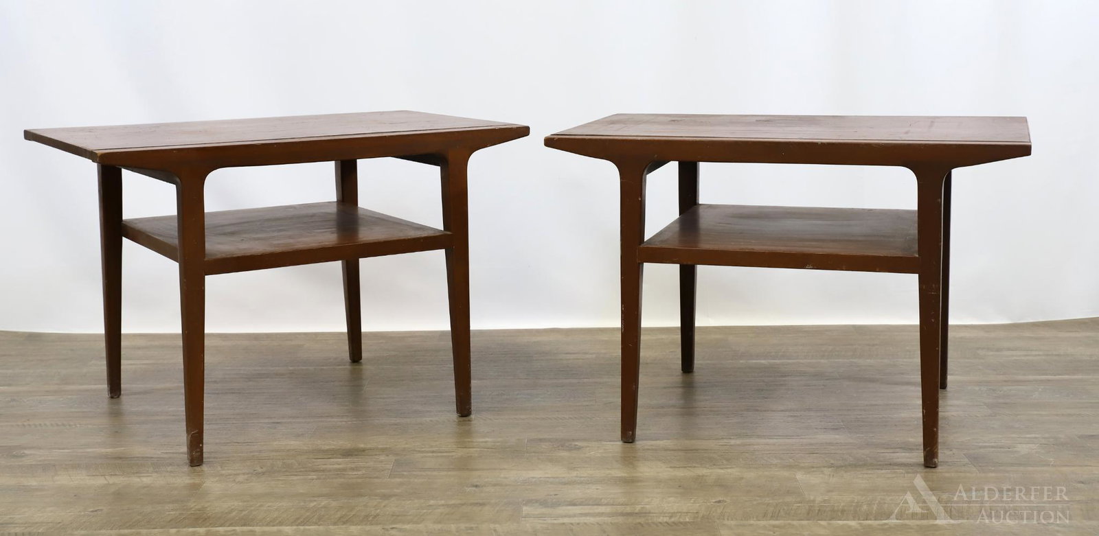 Pair of Teak End Tables Selig Denmark: (2) Tiered teak tables on tapered legs. 20"h x 30"w x 20"d