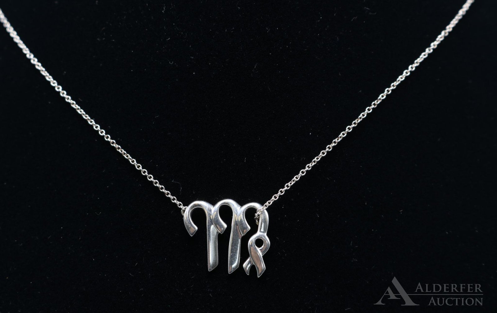 Tiffany & Co. Paloma Picasso Virgo Necklace: Sterling silver. 15 x 17mm zodiac horoscope pendant on 17" long chain. 3.0gtw.