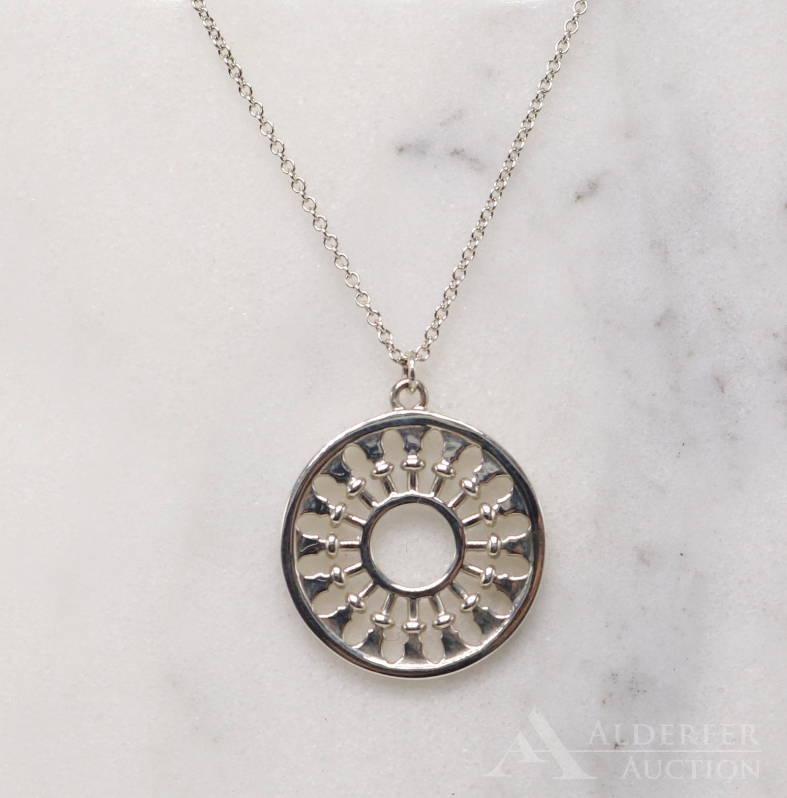 Tiffany & Co. Paloma Picasso Pendant: Venezia Stella Medallion Necklace. 19.5mm round sterling silver pendant on 18" long chain. 3.5gtw.