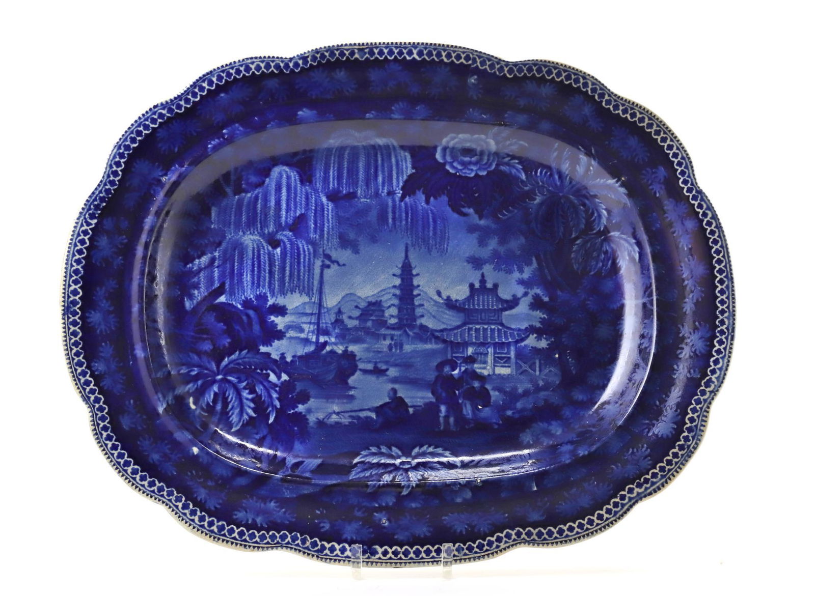 R.Stevenson Staffordshire Platter: Flow blue Staffordshire platter in the Palestine pattern, signed R. Stevenson. England, 19th century. Discoloration and crack on back side. 19.25"w x 15.5"d