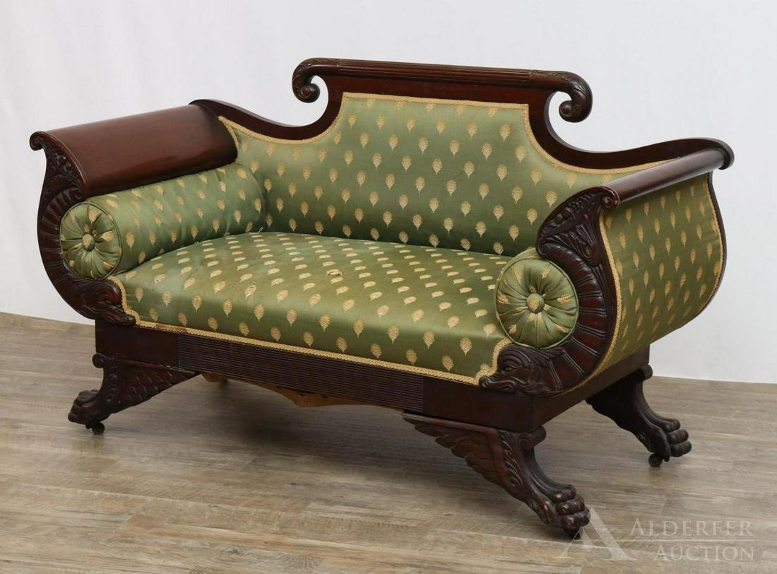 Federal Ornate Carved Mahogany Settee: Scrolled crest and arms with richly carved dolphin motifs on winged hairy paw feet on casters. Silk fabric. 33"h x 55"w x 25"d