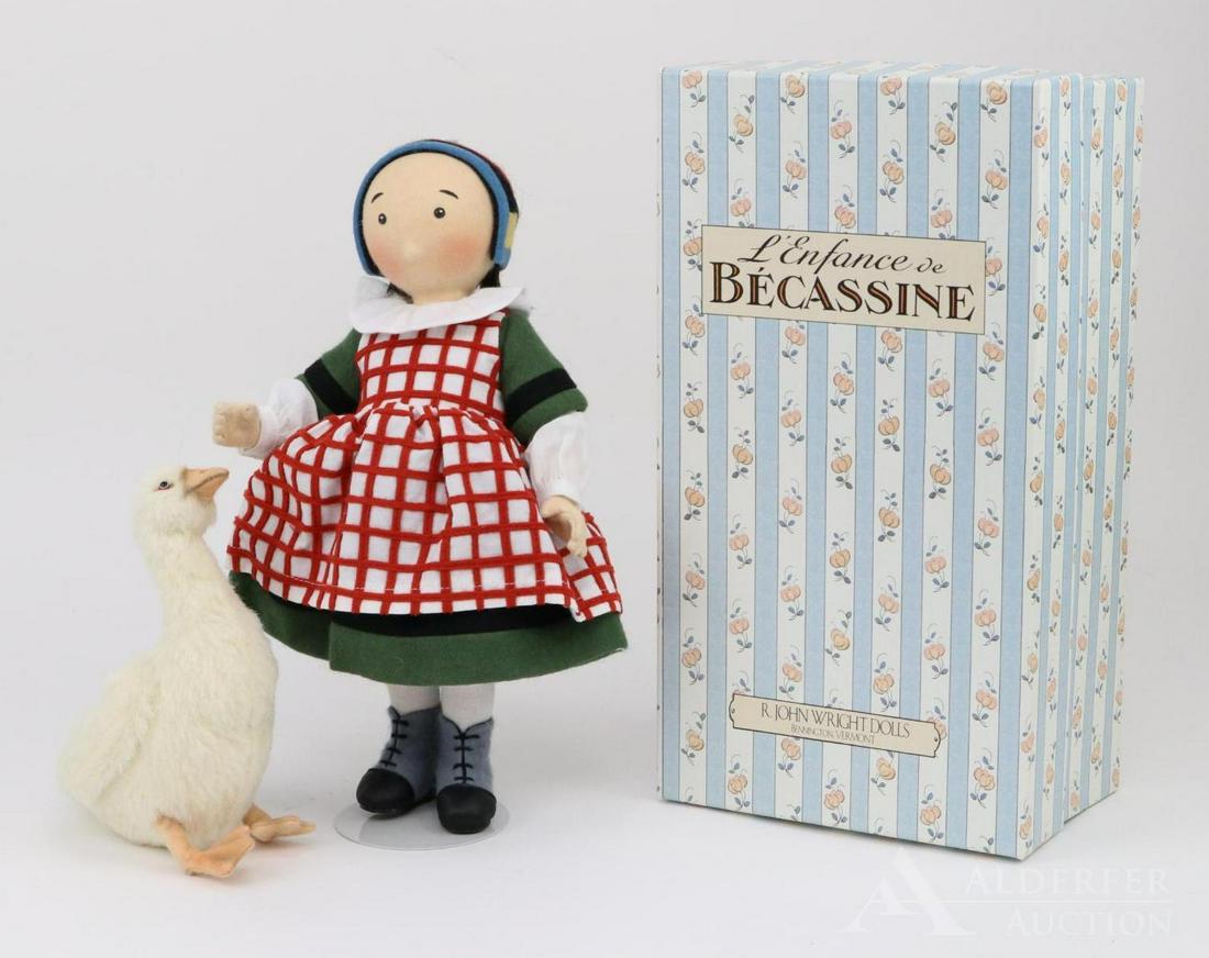 LOT OF R. JOHN WRIGHT.: MIB. Set of 2006 "L'Emfance de Becassine" (11" Becassine doll with her 6 1/2" goose). This set was Made Exclusively for a UFDC special event "Silly Goose Tales" July 13, 2006 No. 46/400.
