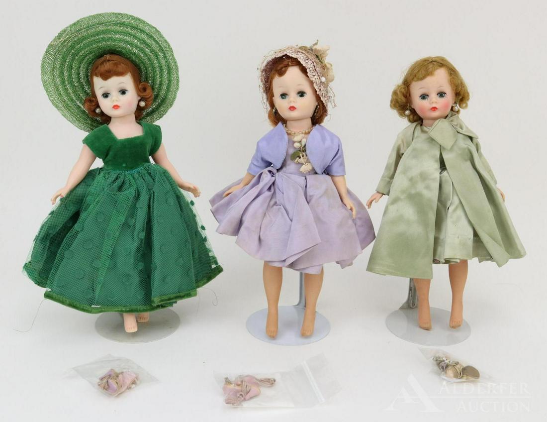 LOT OF 1950's-1960's DOLL(S).: Lot of (3) 1958-1963 Madame Alexander "Cissette" dolls. (2) Of them are dressed in original clothing and have their high heel shoes. Redhead is dressed in 1958 #943 tagged lavender 2 pc. tafetta outfi