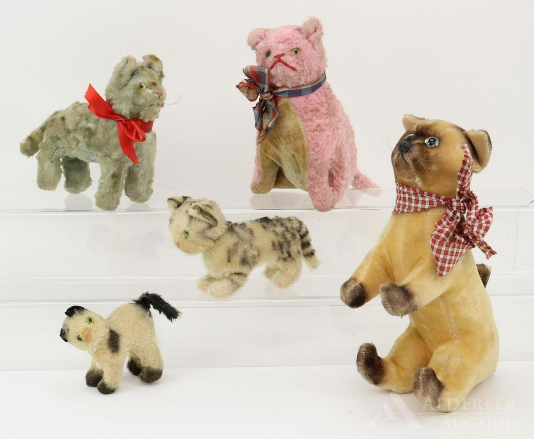 LOT OF VINTAGE CATS.: Lot of (5) cats. Unmarked 4" T & 5" T Steiff cats with green eyes. Black airbrushed detail. 4" Has glass eyes and a swivel head. Condition: wear on mohair and felt ears. (3) Plush cats with glass eyes