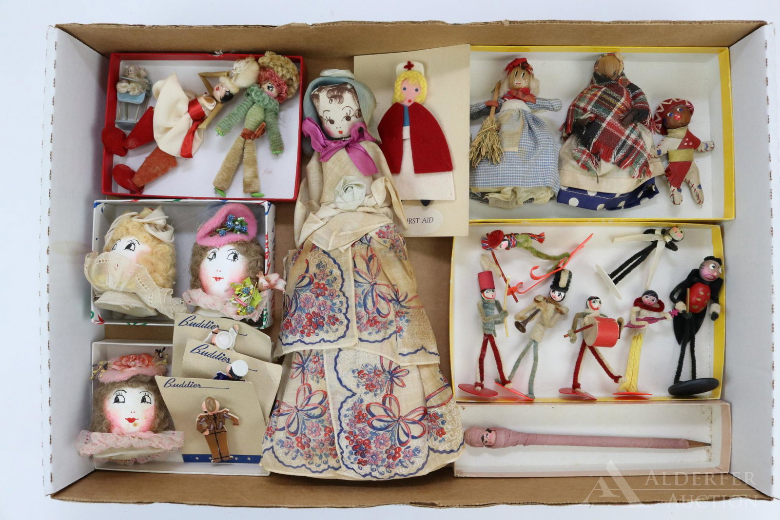 LOT OF HOLIDAY/NOVELTIES.: Lot of novelties. Handkerchief doll. (3) Nut head dolls. (3) Painted/decorated lady heads made from blown eggs. (3) Carded Military "Buddies" pins. (5) Pc. chenilile band. (3) Other misc. chenille pcs