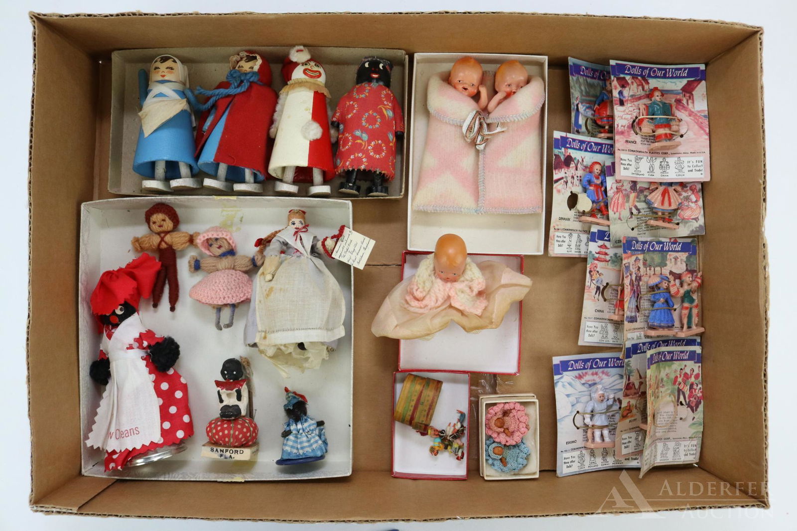 LOT OF HOLIDAY/NOVELTIES.: Lot of novelties and dolls. Novelties - (4) Ramp Walkers: Black, clown, Nurse, Red Riding Hood. (Made in USA). Black New Orleans bell. Little Black child eating watermelon slice from Sanford, Fla. Dol