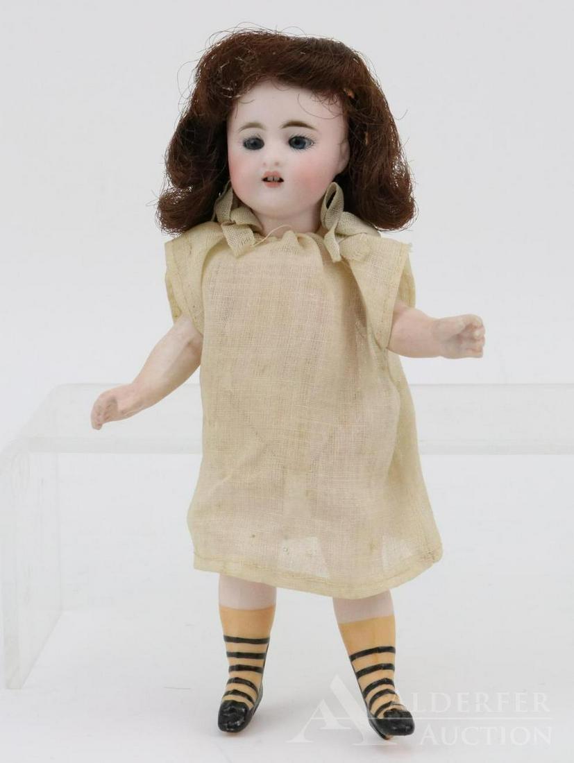 LOT OF ALL BISQUE DOLL(S).: 7 1/2" S & H 886 Doll. This is an early doll with blue sleep eyes, open mouth with (2) square cut teeth, replaced wig. Swivel head with 5 pc. body. Unusual 5-strap heeled bootines with orange socks. D