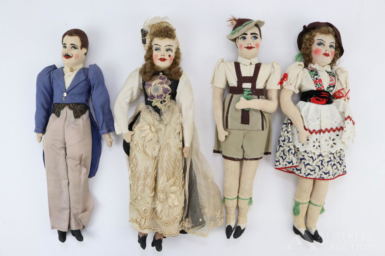 DOLL(S) REPRESENTING OTHER COUNTIRES.: Lot of (4) 14" all original cloth dolls. All of the dolls have stockinette mask faces with painted features. The men have painted hair, the women have human hair wigs. Possibly 1940's. Tyrolean man an