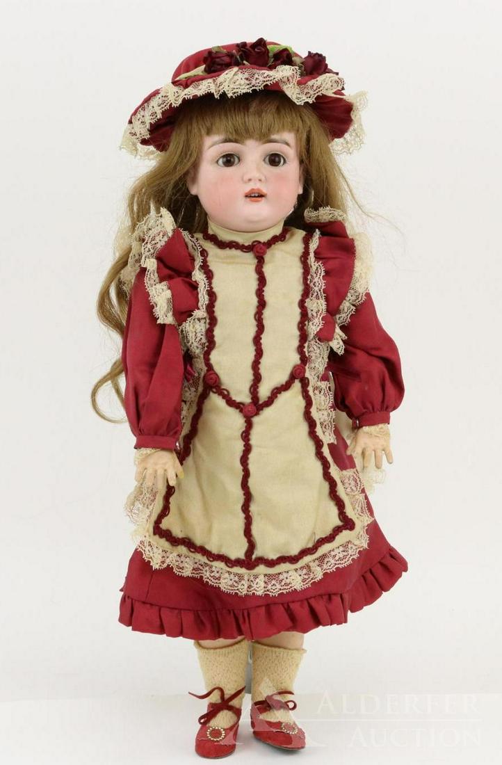 ANTIQUE GERMAN BISQUE HEAD DOLL.: 18" G MADE IN GERMANY 11 129 Doll. Brown sleep eyes, open mouth, brown French human hair wig. Papier mache 6 -ball jointed body. Dressed in reproduction silk dress with matching hat; newer underwear. 