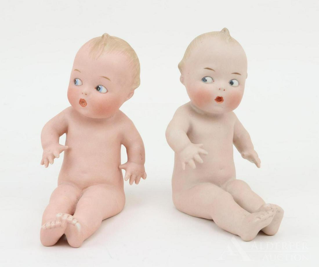 LOT OF ALL BISQUE DOLLS.: Pair of HEUBACH "Action Babies" 9743 4 and 9748 4 (square symbol). 4" Baby was originally attached to a vase or container. Condition: piece of container is still on back of baby. 4 1/2" Baby. Conditio