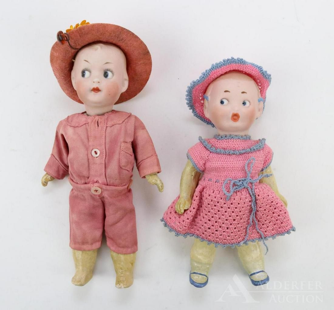 ANTIQUE BISQUE HEAD DOLL(S), 12" AND UNDER.: Pair of GOOGLY eye dolls. Both dolls have solid domes with painted features inc. blue/black side glance eyes, blonde hair. 5 Pc. papier mache bodies. 6 1/2" Girl is marked R50A 13/0. She has integlio 