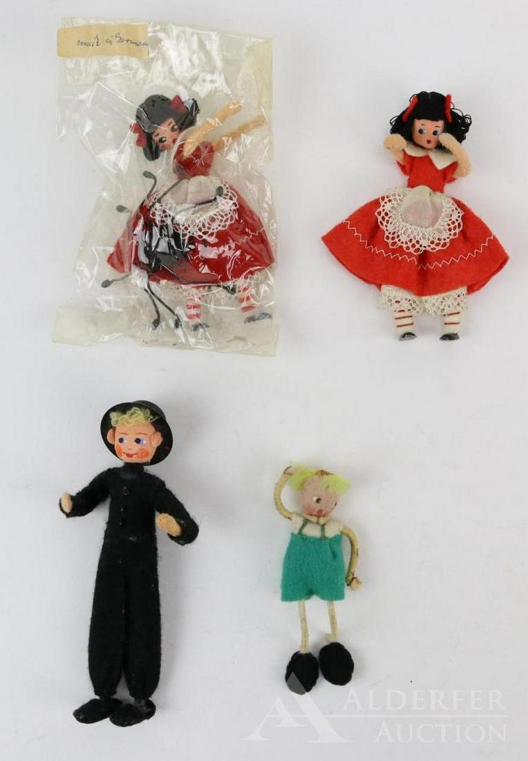 LOT OF HOLIDAY, NOVELTY.: Lot of (5) BAPS dolls/figures. "Little Miss Muffet with Spider" in original cellophane. Marked Made in Germany. "Little Miss Muffet" without spider. "Child with startled expression". Unknown man in bl