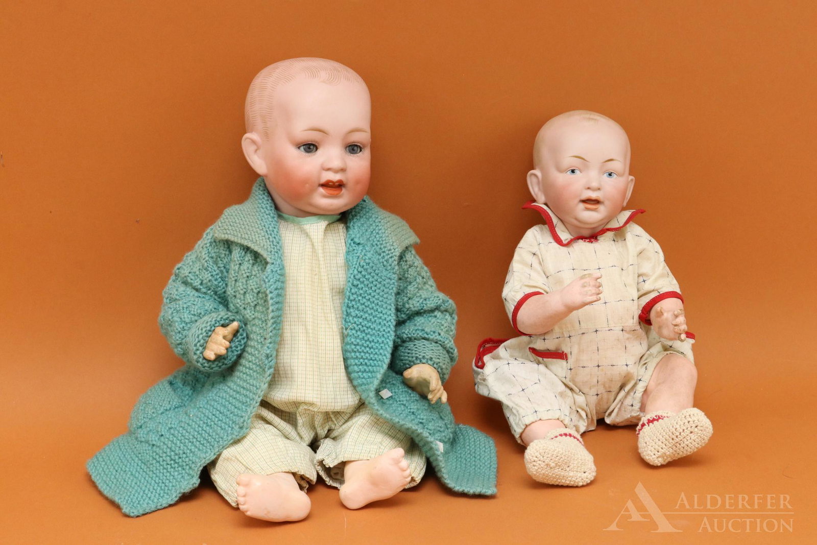 LOT OF GERMAN BISQUE HEAD BABY DOLLS.: Pair of solid dome character dolls with open/closed mouths. Both dolls have blue eyes, painted blonde hair, 5 pc. papier mache bent limb baby bodies. 16" 3-10 Doll with sleep eyes. Dressed in vintage 