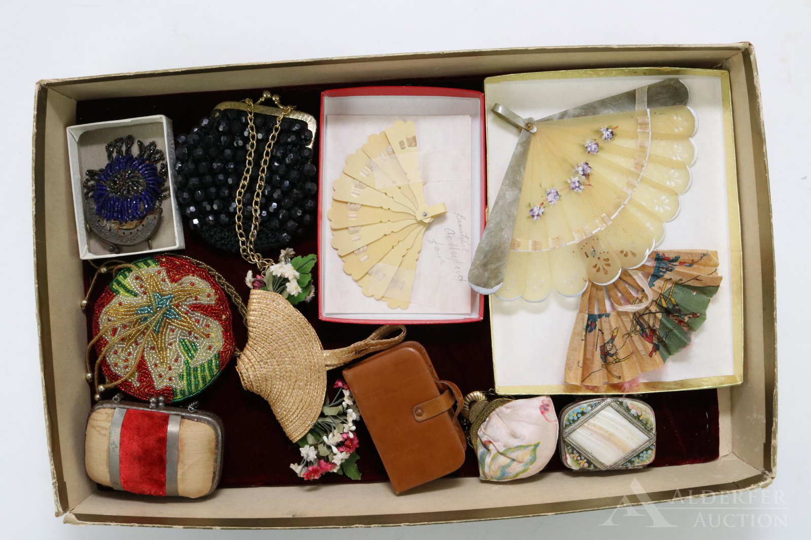 LOT OF DOLL ACCESSORIES.: Antique/vintage. (3) Fans. (7) Handbags - beaded, mother-of-pearl, Hoyer type, leather, woven basket with flowers, velvet. Condition: this lot is being sold AS IS.