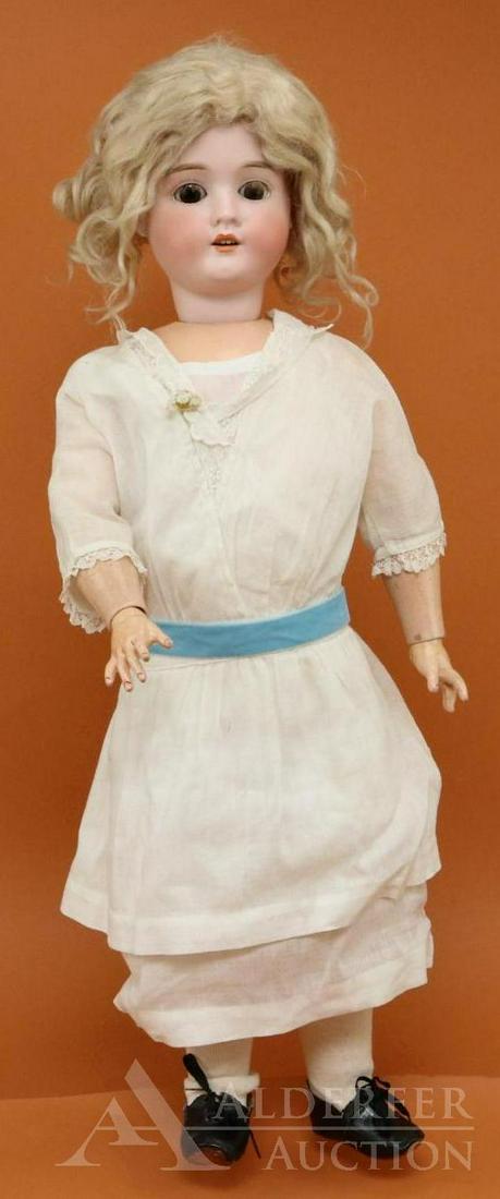 ANTIQUE GERMAN BISQUE HEAD DOLL.: 26" S (PB in star) H 1906 10 GERMANY doll. Brown sleep eyes, open mouth, blonde mohair wig. Papier mache ball jointed body. Dressed in antique white cotton clothing: dress, petticoat, pantaloons, sock