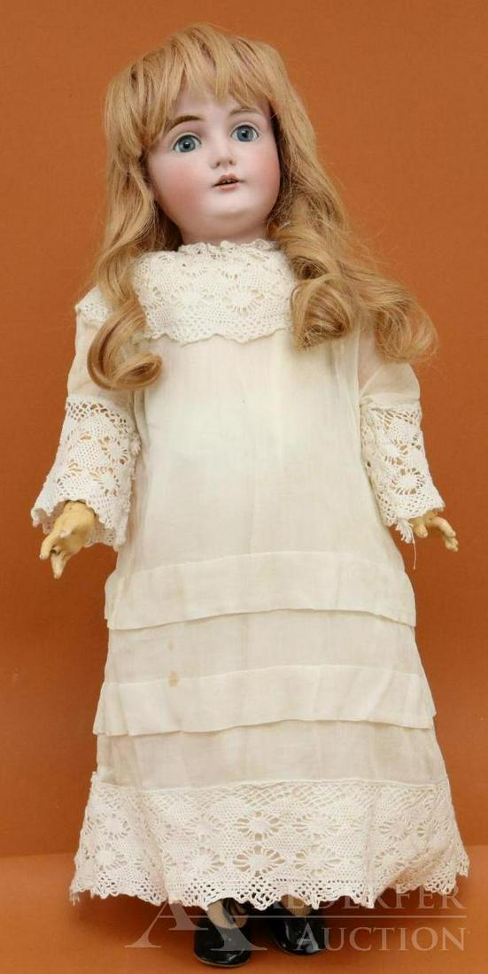 ANTIQUE GERMAN BISQUE HEAD DOLL.: 25" K 1/2 MADE IN GERMANY 14 1/2 164 doll. Blue sleep eyes, open mouth, strawberry blonde human hair wig. Plaster pate is marked 171/11. Papier mache ball jointed body is marked (red stamp) Germany 5.