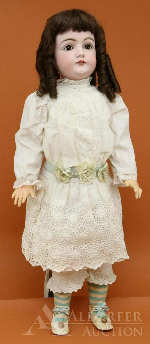 ANTIQUE GERMAN BISQUE HEAD DOLL.: 28" L 1/2 MADE IN GERMANY 15 1/2 146 doll. Brown sleep eyes, open mouth, synthetic brown wig, plaster pate. Papier mache ball jointed body. Dressed in antique white cotton clothing: dress with eyelet/
