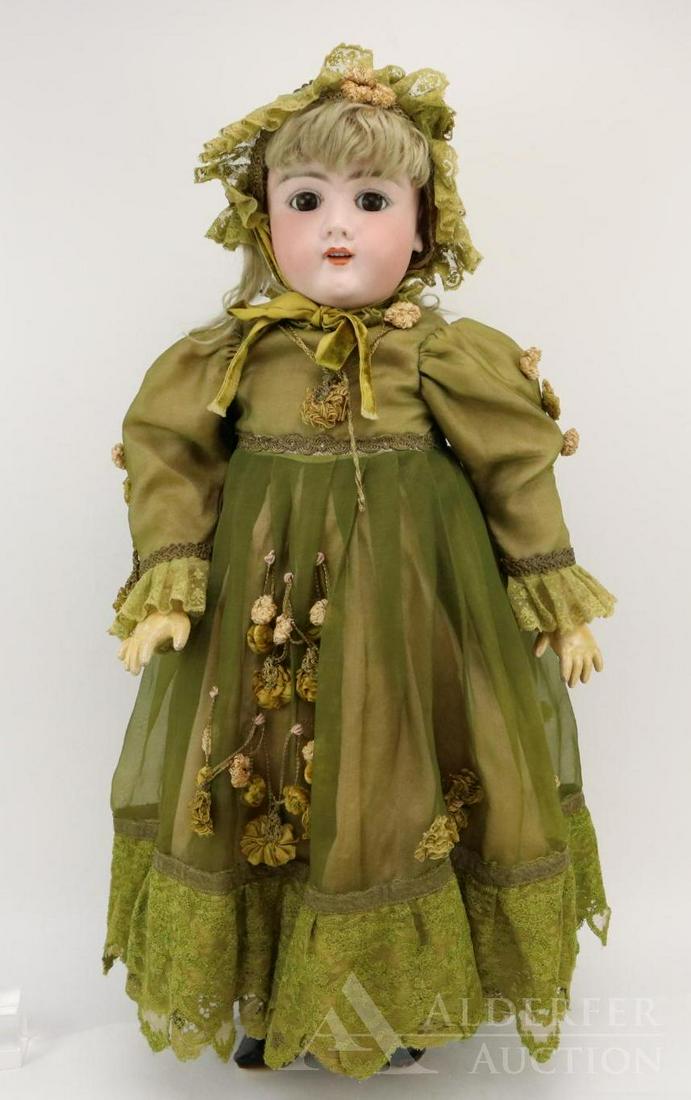 ANTIQUE GERMAN BISQUE HEAD DOLL.: 30" 109 - 15 DEP doll. Brown sleep eyes, open mouth, pierced ears, blonde mohair wig, plaster pate. Very clean papier mache 6-ball jointed body marked (red stamp) HANDWERCK. Dressed in tagged Ada Van