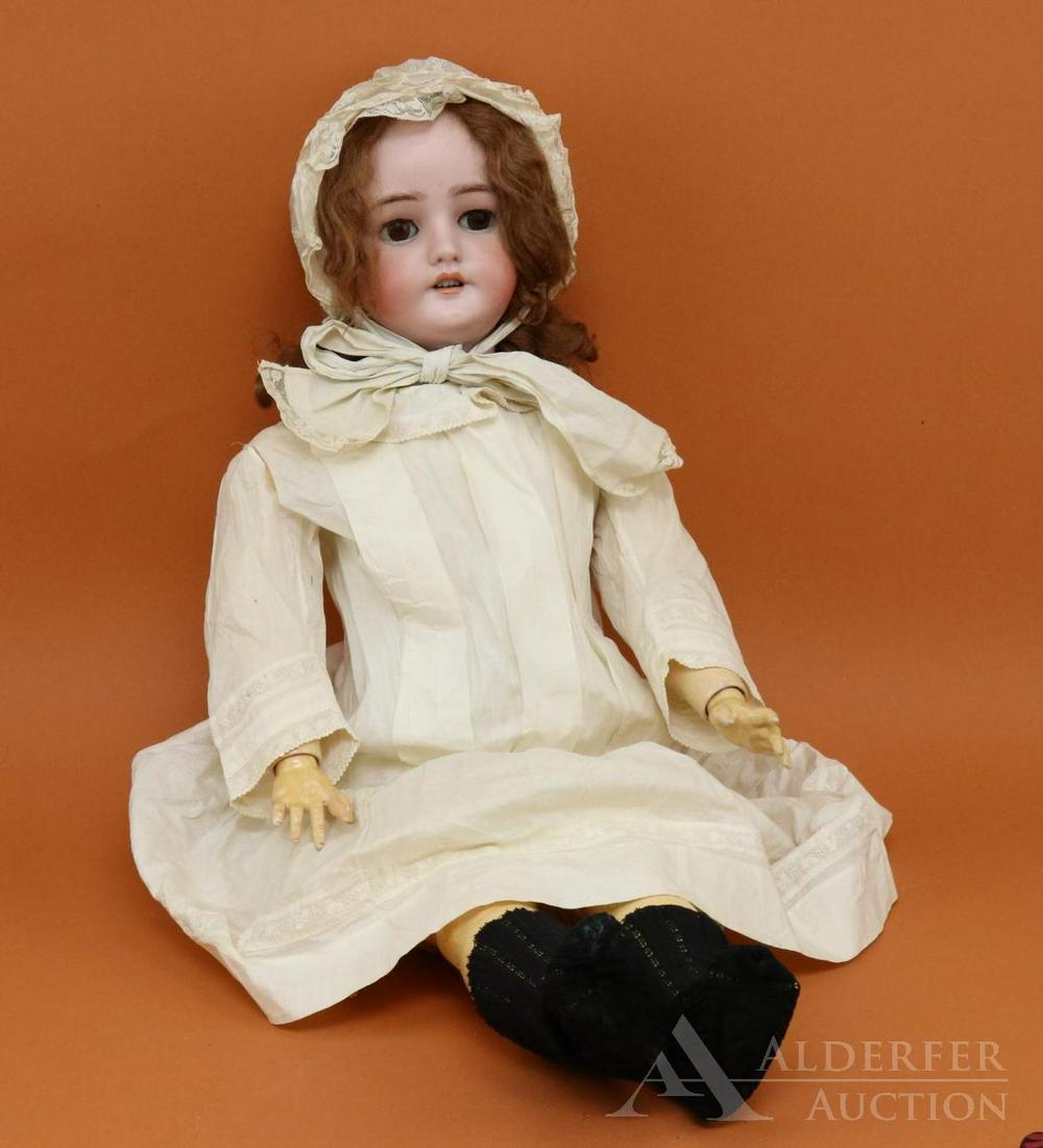 ANTIQUE GERMAN BISQUE HEAD DOLL.: 31" C M BERGMAN SIMON & HALBIG 14 1/2 doll. Brown sleep eyes, open mouth, pierced ears, very full brown curly mohair wig, plaster pate. Very clean 6-ball jointed papier mache body is spring strung. Dr