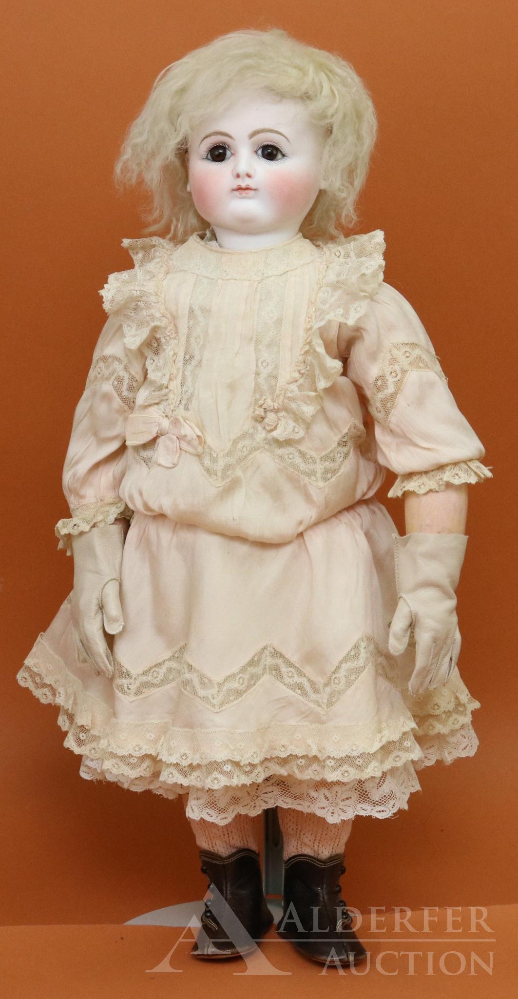 ANTIQUE FRENCH BISQUE HEAD DOLL.: 20" P.2.D. (Petit & Dumoutier, Paris) doll with beautiful pale P D coloring. Brown paper weight eyes, closed mouth, pierced ears, white fur wig. Original papier mache 8-ball jointed body with pewter h