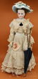 ANTIQUE FRENCH FASHION BISQUE HEAD DOLL.