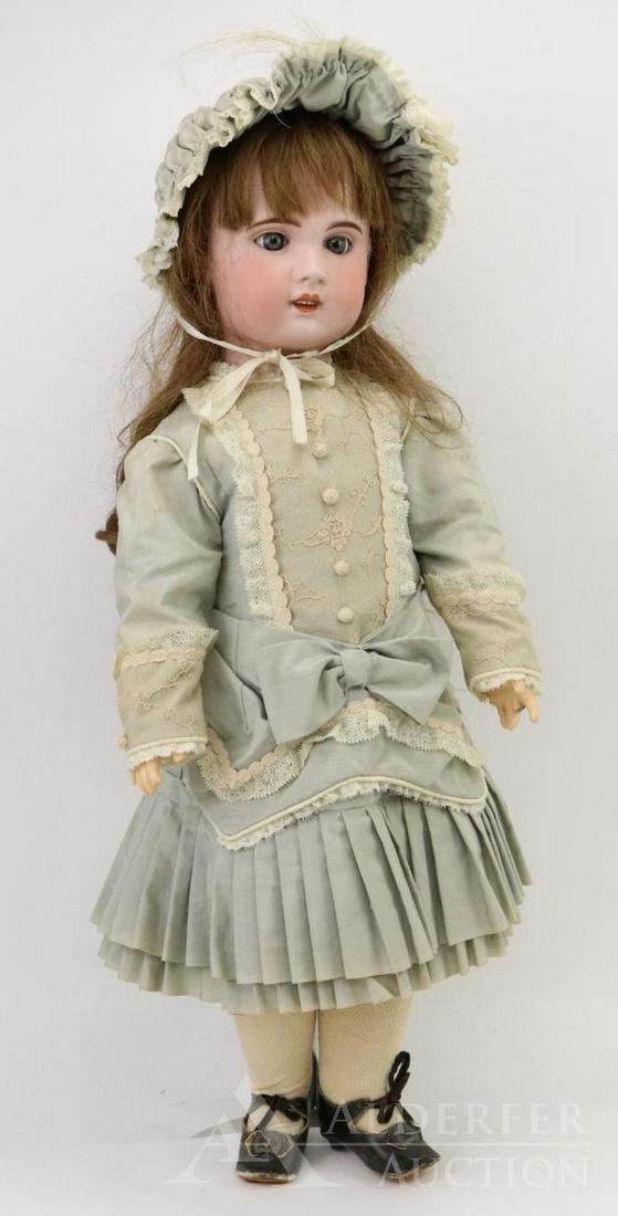 ANTIQUE FRENCH BISQUE HEAD DOLL.: 27" SFBJ PARIS 13 doll with blue sleep eyes, open mouth, pierced ears, brown human hair wig. Papier mache jointed body. Dressed in beautiful reproduction drop waist French style dress with matching bo