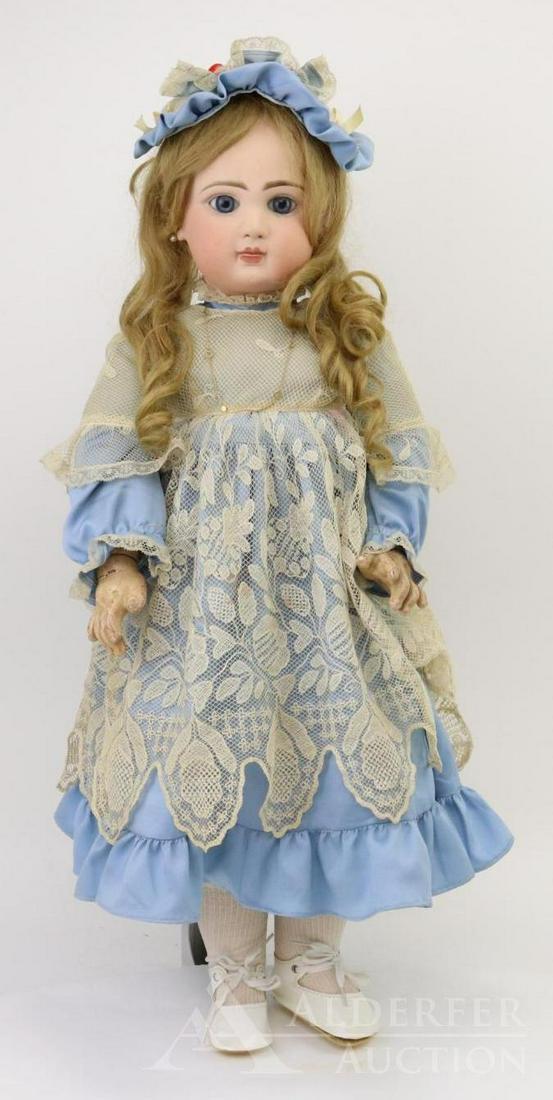 ANTIQUE FRENCH BISQUE HEAD DOLL.: 26 1/2" (Red stamp) DEPOSE JUMEAU S.G.D.G. doll with blue paper weight eyes, closed mouth with slight space between lips, pierced ears, long curly honey blonde human hair wig, cork pate. Papier mache 