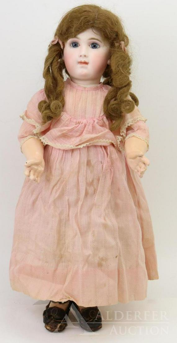 ANTIQUE FRENCH BISQUE HEAD DOLL.: 26" E J. A 10 doll with blue paper weight eyes, closed mouth with slight space beween lips, applied pierced ears, long curly brown human hair wig, cork pate. Papier mache jointed body with straight wr
