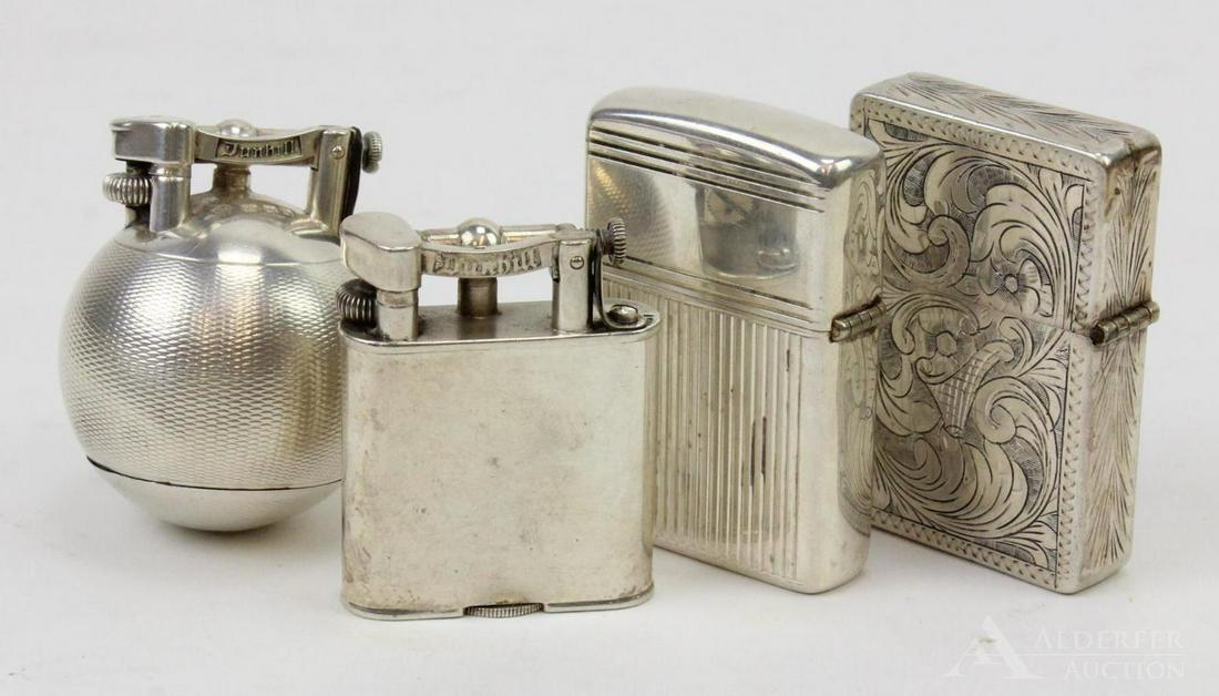 Silver Lighters: Grouping of (4) lighters including: Dunhill sterling lift arm lighter, patent no. 143752, Paris; Dunhill sterling spherical "Unique Lighter", no. 143752, Zippo ribbed sterling flip top lighter, and a