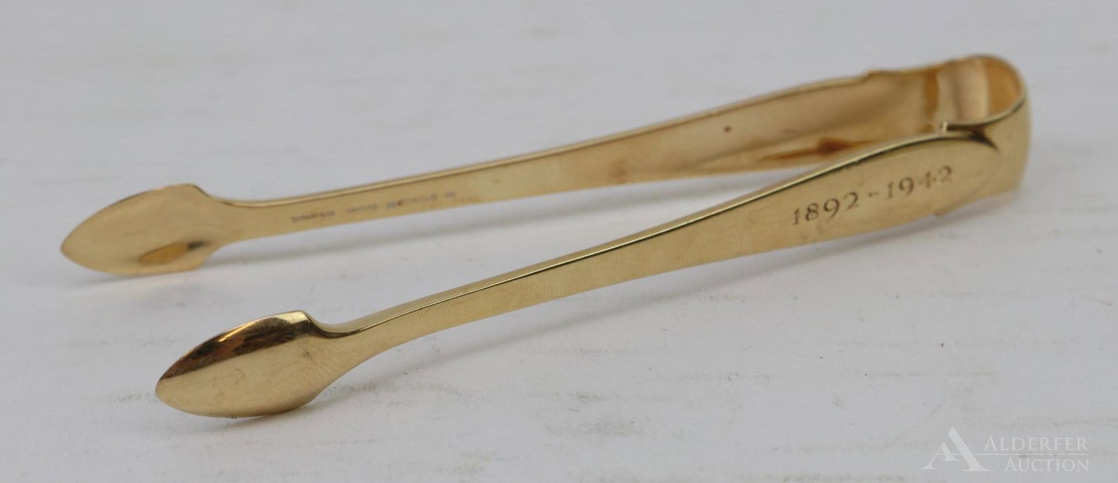 Tiffany & Co. 14k Gold Sugar Tongs: Monogrammed 14k yellow gold sugar tongs by Tiffany and Co. in faneuil pattern. 4" and 17.4dwt
