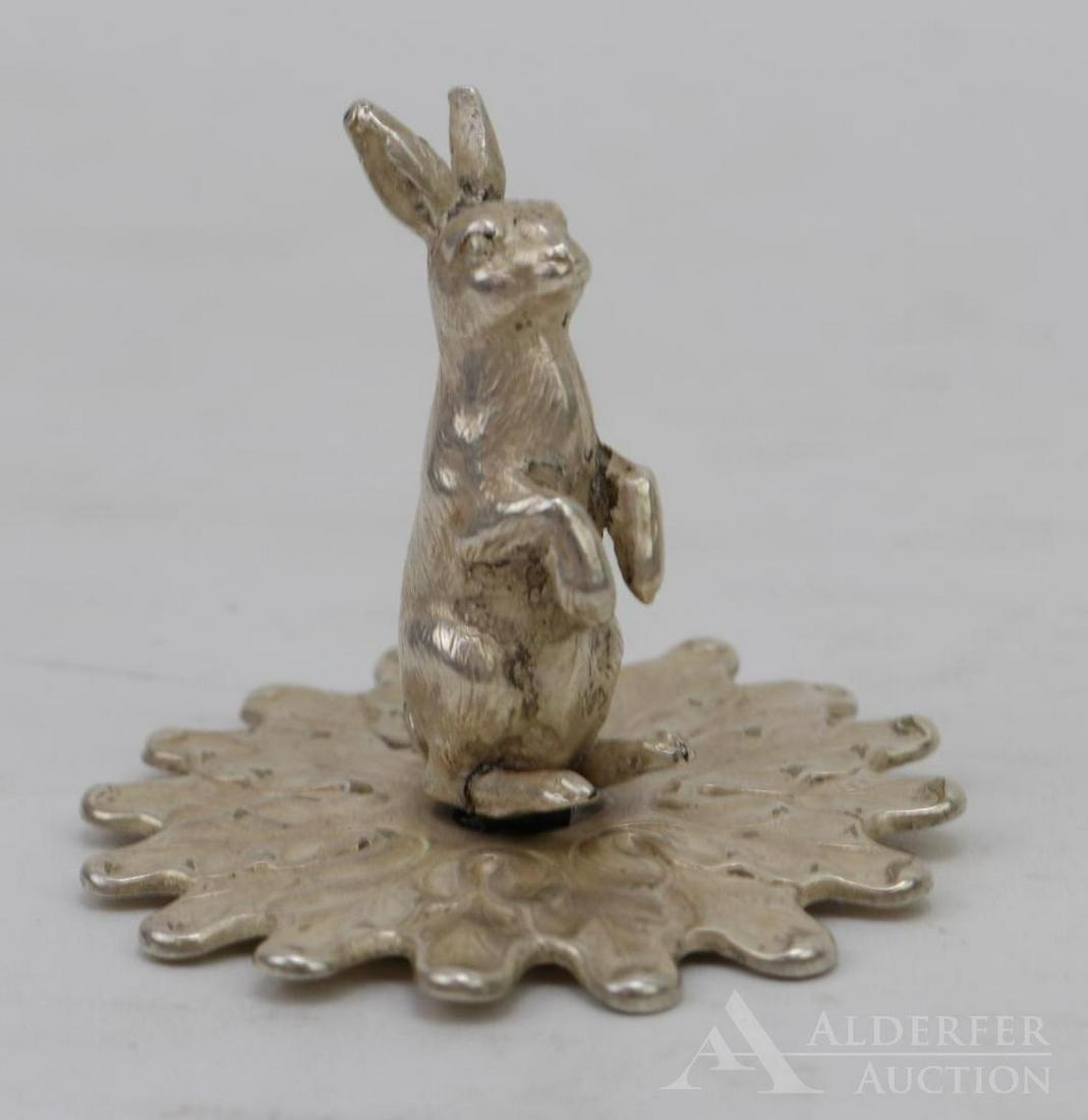 Tiffany & Co. Pen Wipe: Monogrammed silver plated figural rabbit pen wipe. Hallmarked with a "V" and 336 and 230. 1.5"h