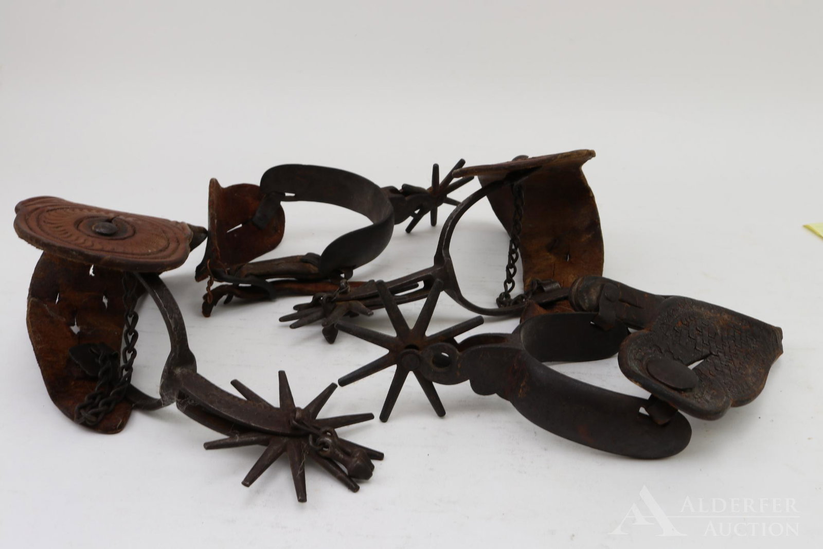 Early Spur Grouping: Small spears measure 10" length; large spears 12" length (straps and spears included in measurement).