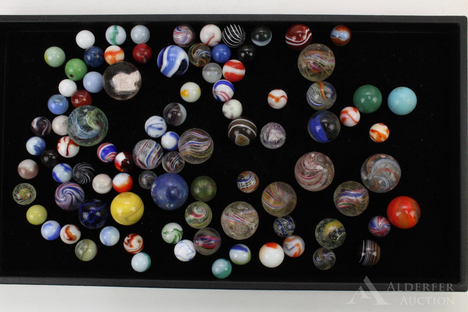 Collection of Early Marbles: Collection of blown marbles in various sizes and design, also includes a single sulfide marble. 91 marbles total.