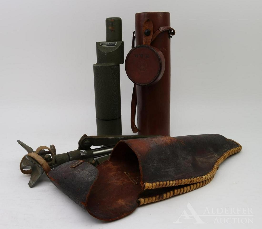 WWII Era Bausch & Lomb M48 19.5 Spotting Scope: World War II era spotting scope with original case and additional optics, M155 tripod and case. Measures 13.5" length; & 17" length (both including case).