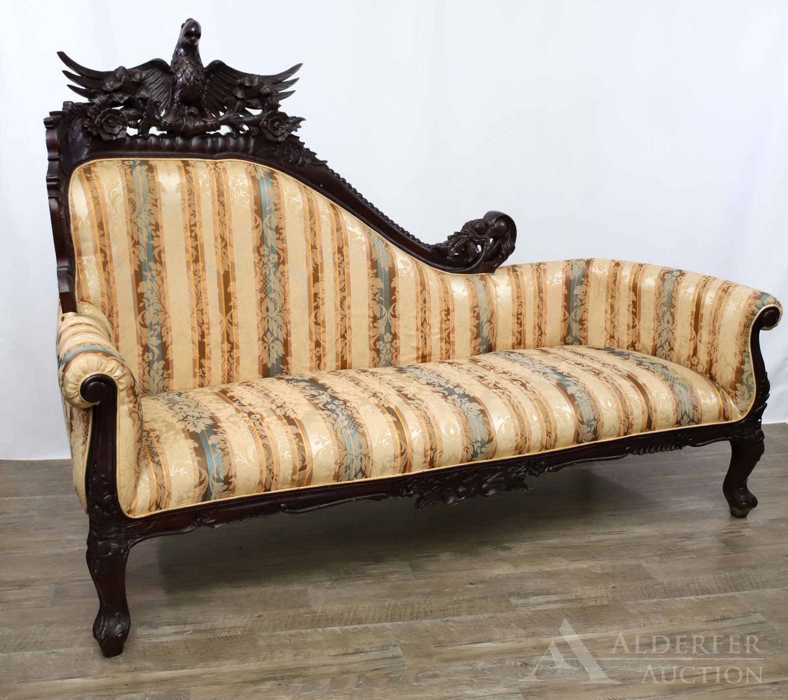 Carved Mahogany and Eagle Motif Recamier: Heavily carved recamier with an ornate eagle crest, scrolled arms on claw feet. 56"h x 72"w x 26"d